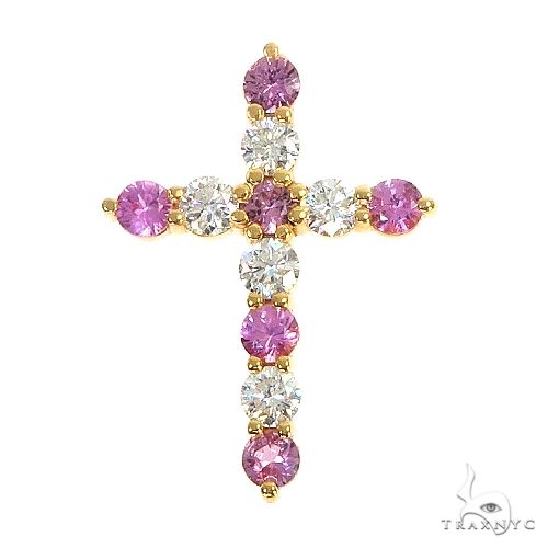 Yellow gold cross pendant with alternating pink sapphires and diamonds