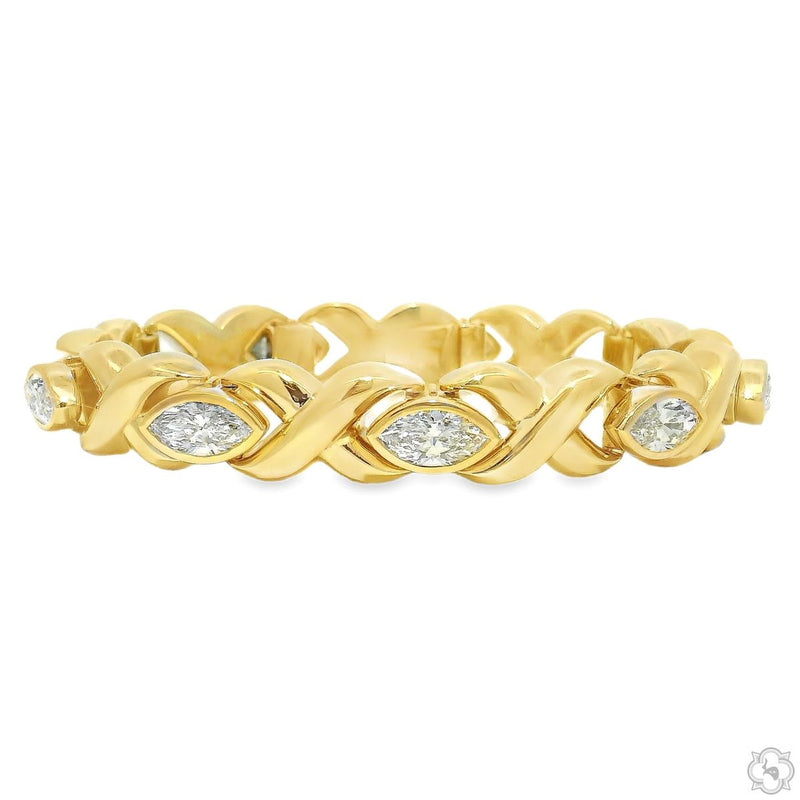 Marquise diamond twist link bracelet with X-style links and faceted marquise stones, top-down view
