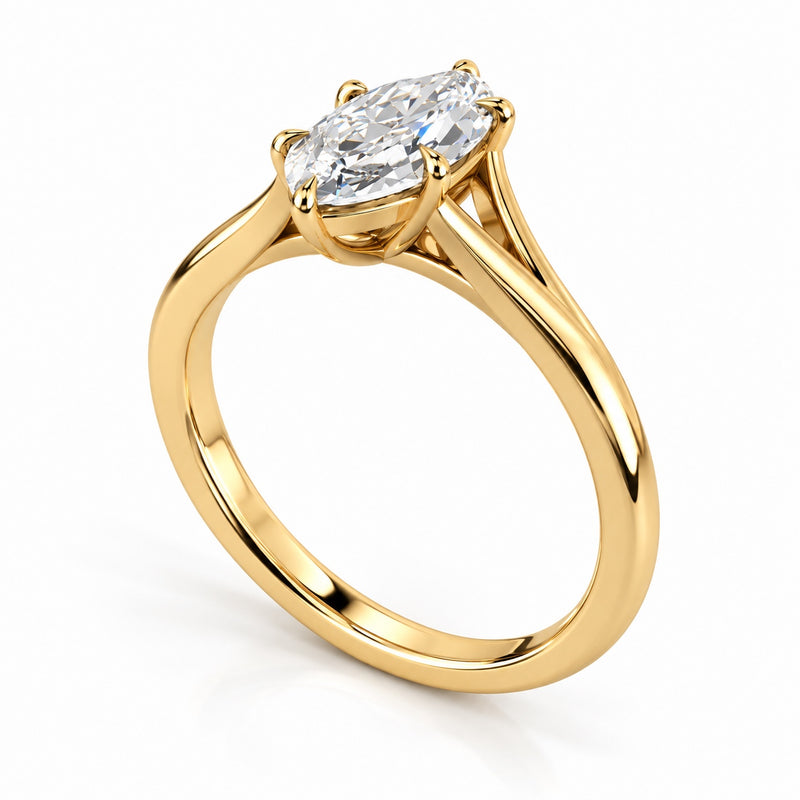 14K yellow gold marquise lab-grown diamond split shank engagement ring, angled view showing the six-prong setting