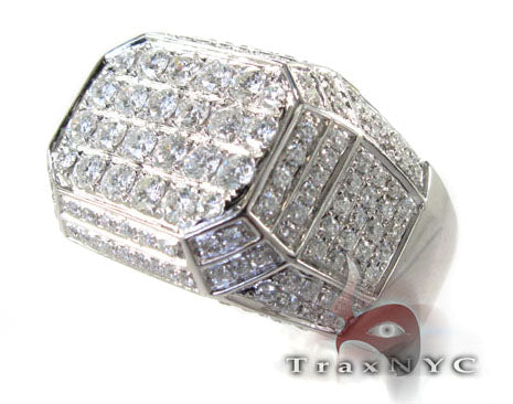 Men's white gold ring with seventeen faceted diamond-studded surface panels