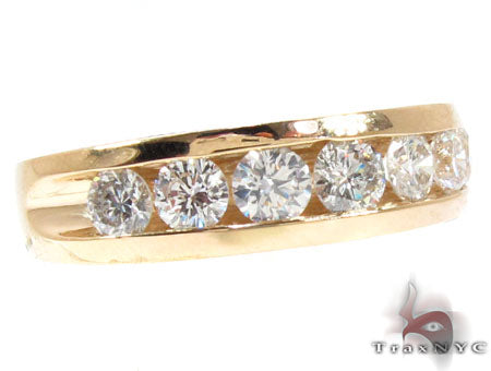 Yellow gold men's band with seven channel-set round diamonds