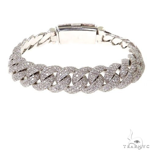 White gold Miami Cuban link bracelet with pavé diamond accents and secure clasp