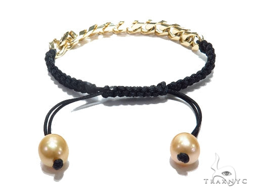 Men's yellow gold Miami Cuban diamond rope bracelet with adjustable black braided band
