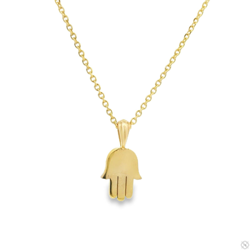 Micro hamsa pendant set in gold – front-facing flat lay showing open-hand silhouette and minimal profile