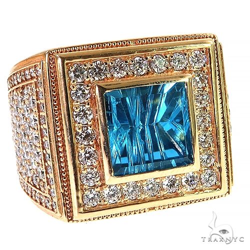 Yellow gold men's ring with square blue topaz center and diamond halo detailing