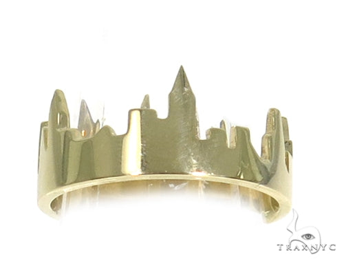 Yellow gold ring featuring a detailed NYC skyline silhouette design