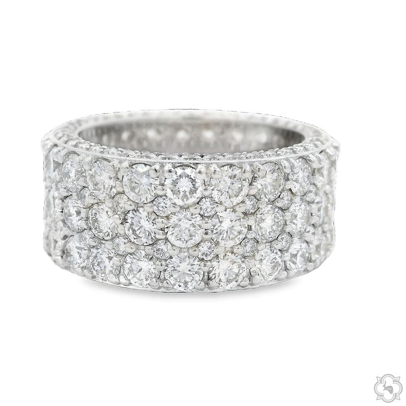 Triple row natural diamond eternity band ring, front view showing three continuous rows of round diamonds