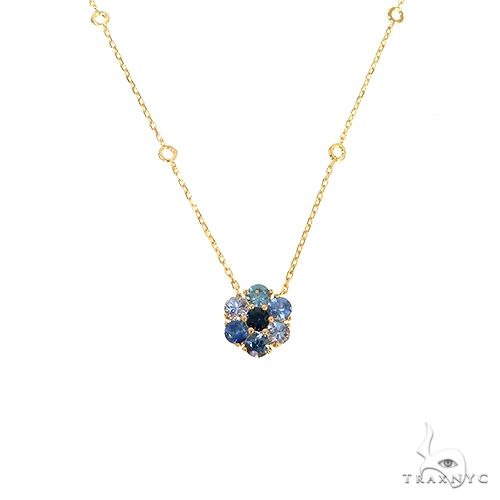 Yellow gold necklace with sapphire and diamond flower-shaped pendant