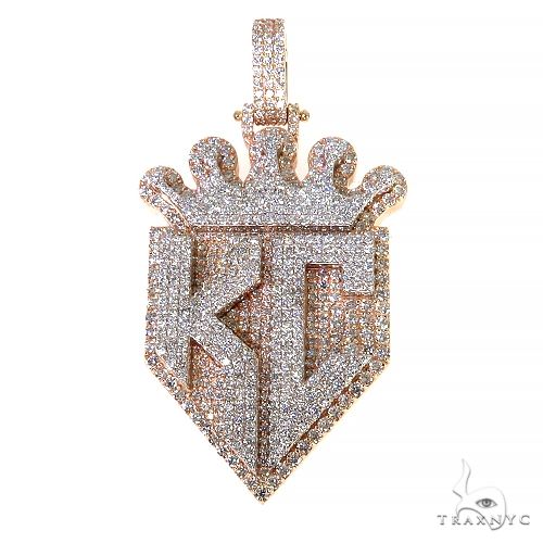 Custom KC diamond initial pendant in 14k two-tone gold, front face view showing round-cut diamond setting