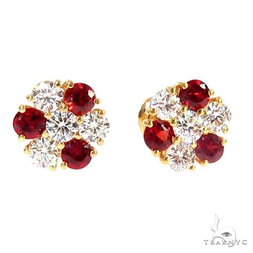 Yellow gold stud earrings with alternating round red sapphires and white diamonds