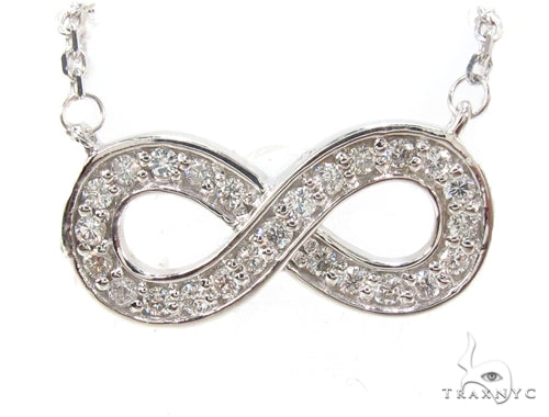 14K white gold necklace with a diamond-set ribbon eternity loop