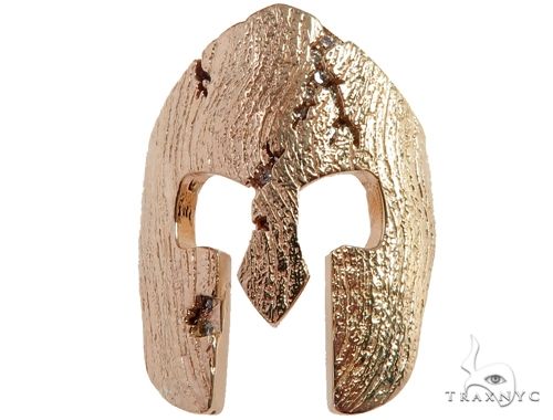 Yellow gold Spartan mask pendant with textured, hammered finish and diamond accents