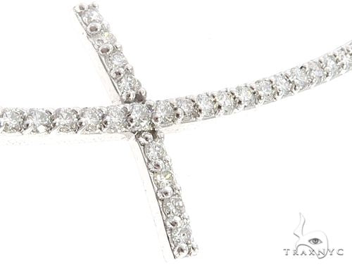 White gold prong diamond cross pendant with sparkling round-cut diamonds on chain