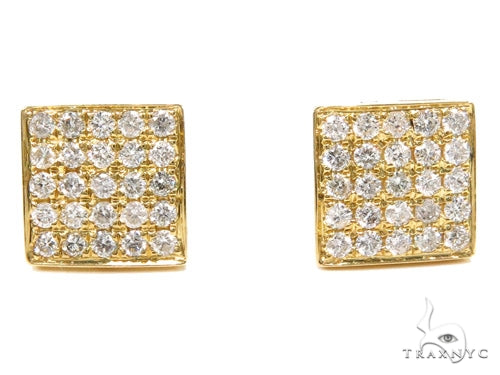 Yellow gold cube-shaped earrings with multiple prong-set diamonds in a grid pattern