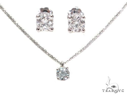 18K white gold diamond necklace and earrings set with prong-set round stones