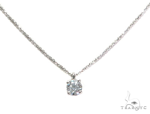 18K white gold necklace with prong-set round diamonds in a complex design