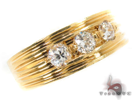 Yellow gold men's ring with three prong-set round diamonds on textured band