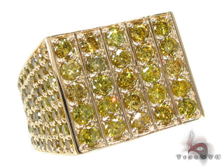 Men's ring with yellow and white prong-set diamonds across a gold band