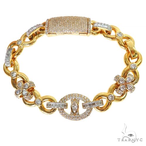Rolo and clover diamond bracelet in yellow gold – alternating rolo links with diamond-set clover stations, top-down view
