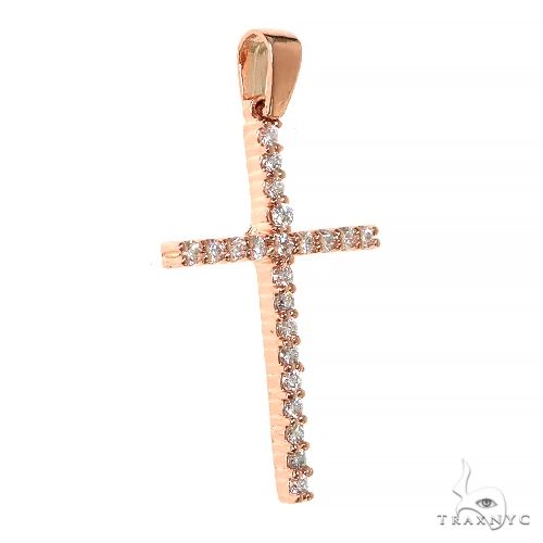 Rose gold cross pendant with round-cut diamonds in a classic crucifix design