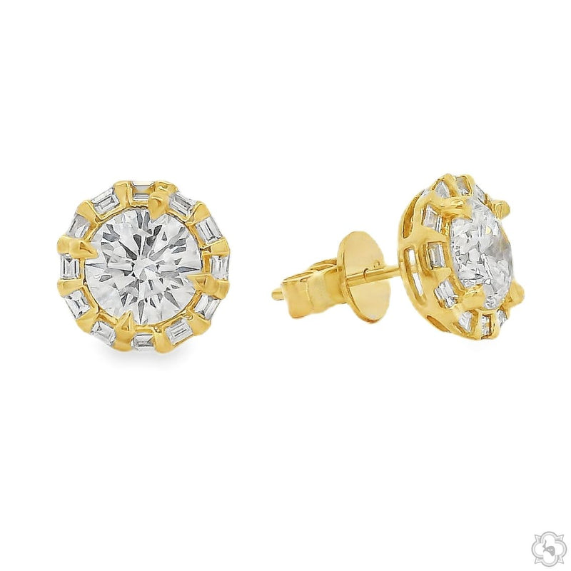 Round diamond studs set in yellow gold with a halo of smaller diamonds