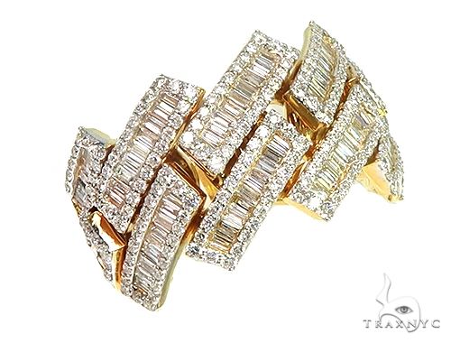 14K yellow gold Cuban ring with baguette-cut diamonds in a wide, linked design