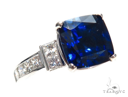 Sapphire and diamond ring with blue center stone and diamond accents