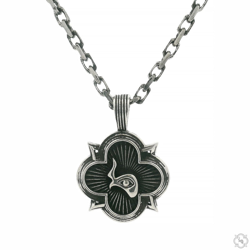 Silver antiqued TraxNYC logo pendant with cable chain, floral quatrefoil design
