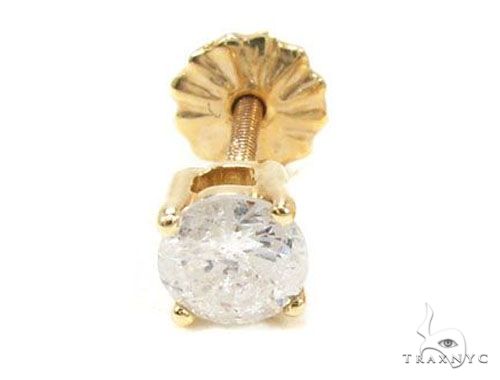 Single prong round diamond stud earring in yellow gold setting with screw back closure