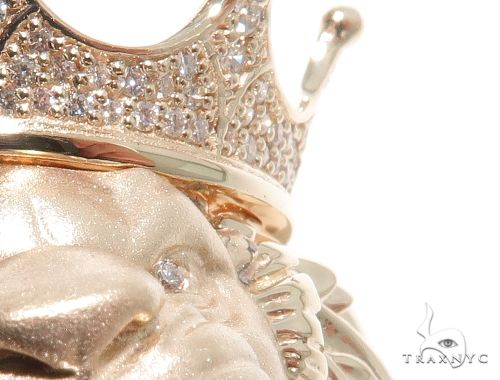 Yellow gold lion head pendant with diamond crown detailing, men’s jewelry accessory