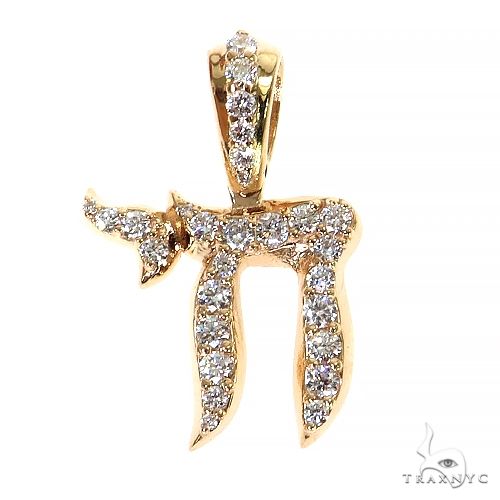 Small yellow gold Jewish Chai pendant encrusted with round brilliant diamonds