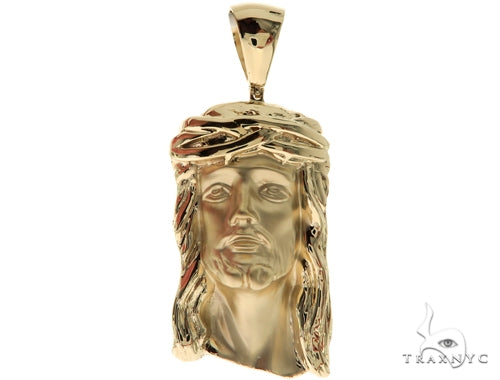 Solid yellow 14K gold Jesus pendant with detailed facial features and crown of thorns