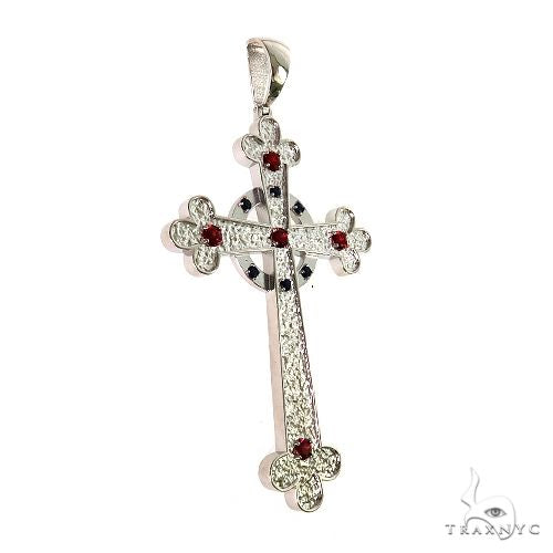 Sterling silver men's cross pendant with red gemstone accents and intricate etched details