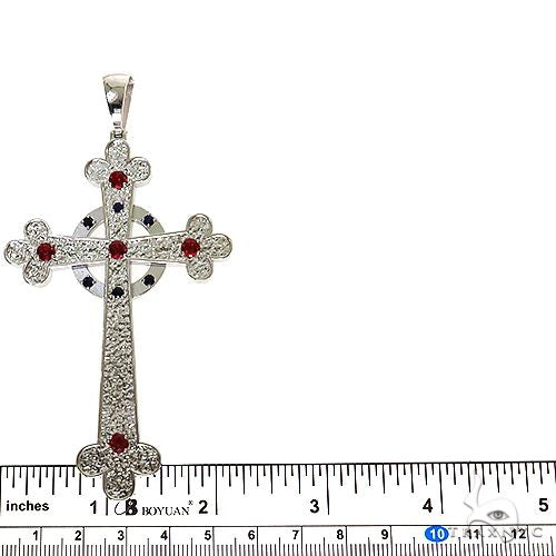 Sterling silver men's cross pendant with red and black gemstones and intricate halo design