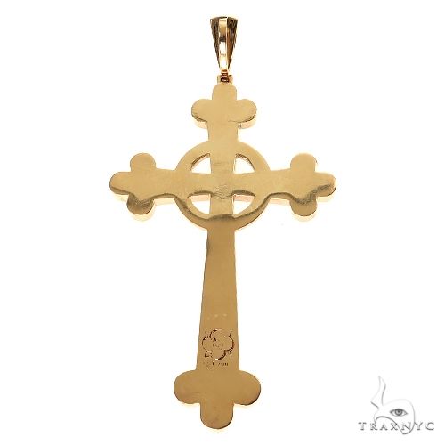 Yellow gold cross pendant with halo design and smooth polished finish