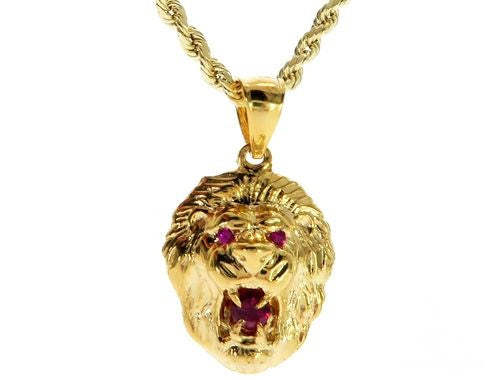 Yellow gold lion pendant with red ruby eyes and central ruby on twisted rope chain