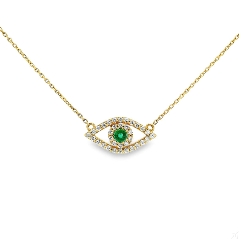 Gold chain necklace with emerald gemstone evil eye pendant surrounded by small diamonds