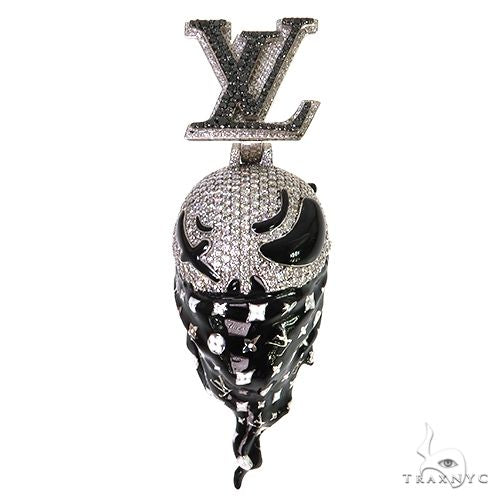 Diamond-set Skellington skull pendant in silver with glow-in-the-dark finish, front view