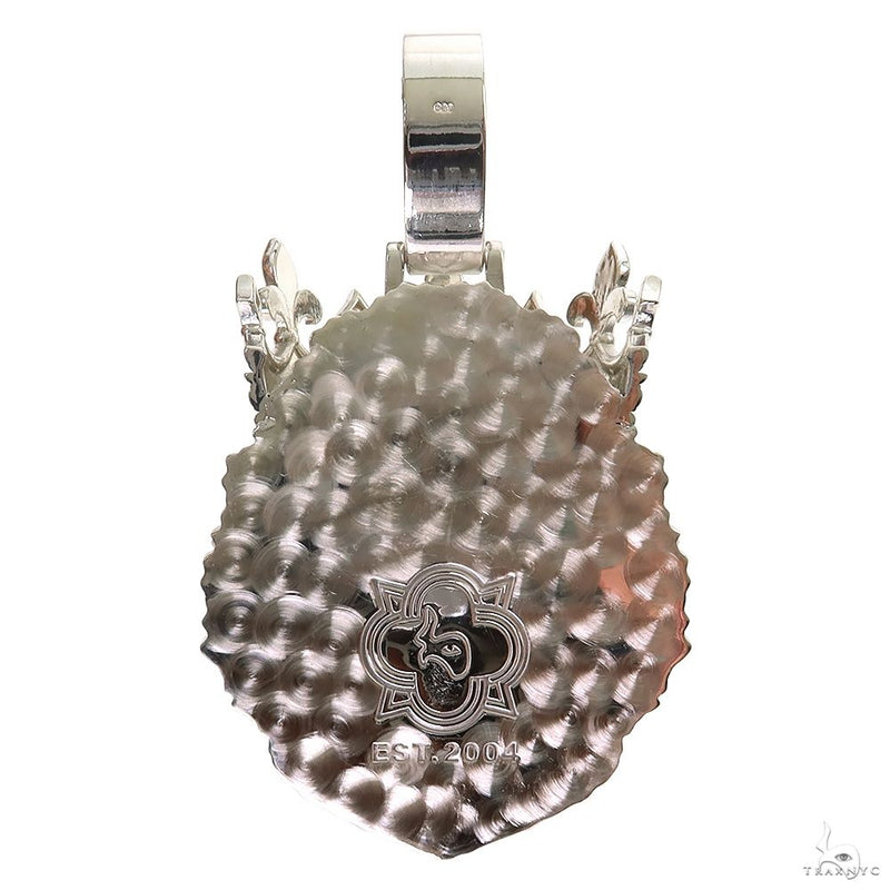 Textured .925 silver lion pendant back with floral hallmark and bail for chain attachment