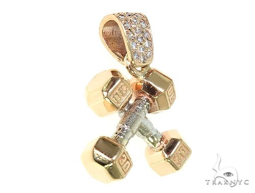 14K two-tone gold dumbbell pendant with diamond accents and detailed barbell design