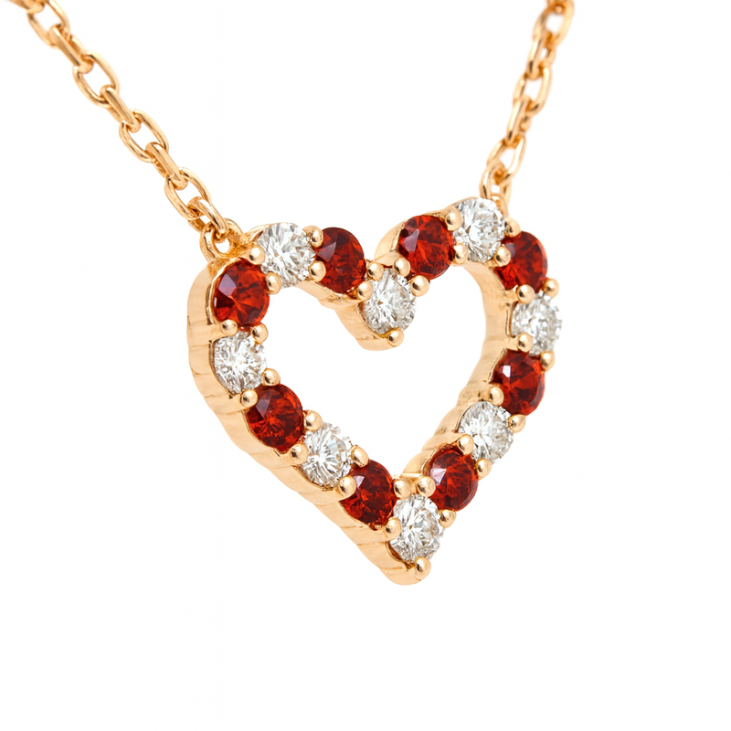 Rose gold heart necklace with red sapphires and white diamond accents
