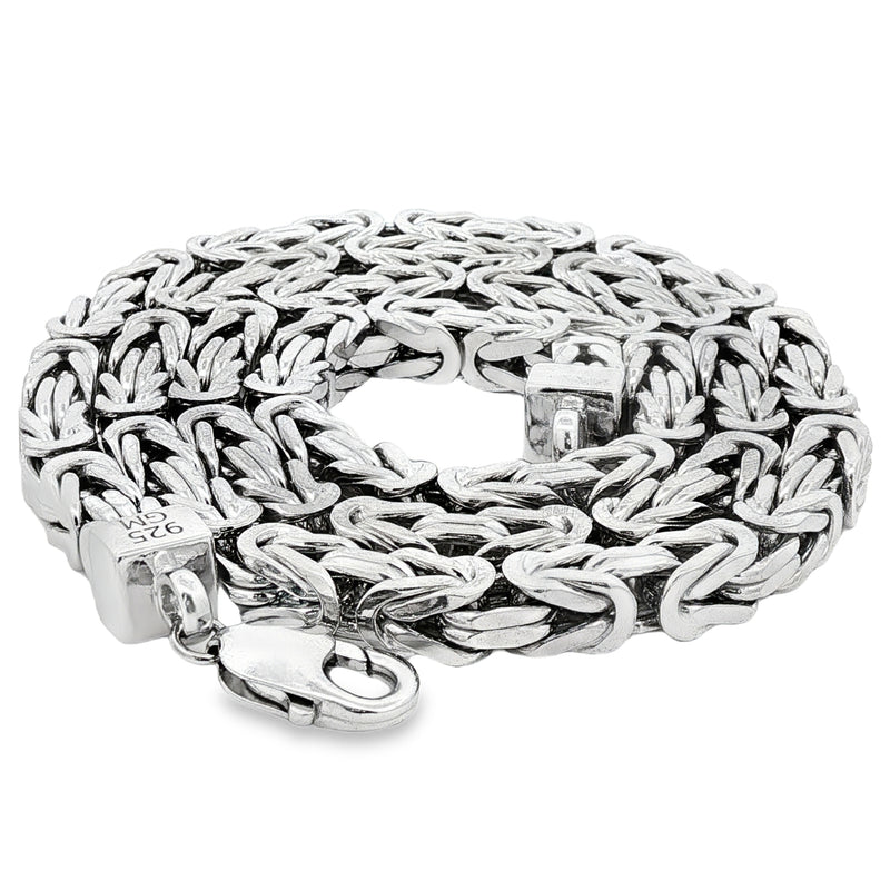 Close-up of a shiny .925 silver Byzantine link chain with 6.2mm thickness and lobster clasp.