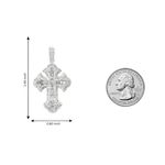 Sterling silver cross pendant with emerald-cut diamonds and decorative edges, 1.4 x 0.8 inch.