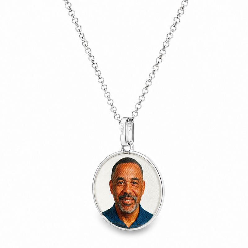 925 silver oval photo pendant necklace with a man’s portrait on a curb chain.