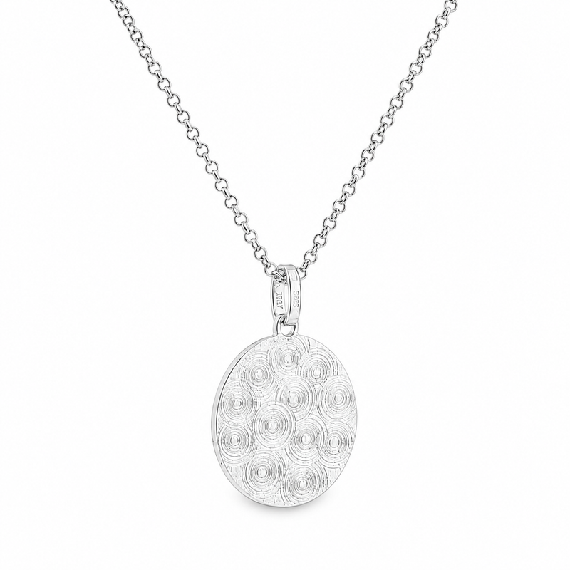 925 silver oval photo pendant with textured spiral pattern on delicate chain.