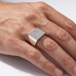 Men's .925 silver pyramid ring with textured detail and small diamond accents.