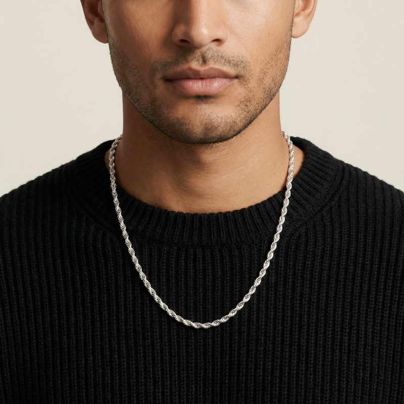 Sterling silver 3.6mm rope chain necklace worn with black ribbed sweater.