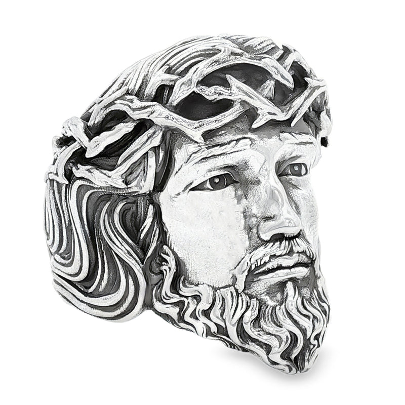 Silver Jesus face ring with detailed crown of thorns and textured beard.