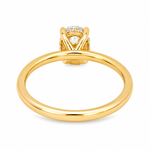 14K yellow gold engagement ring featuring a 1.50 carat oval lab grown diamond in a four-prong setting with a hidden halo and a slim polished solitaire band.