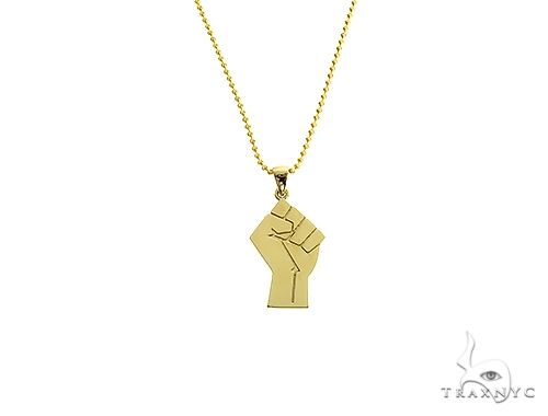 10K gold Power Fist and BLM pendant set — two solid gold silhouette pendants shown together